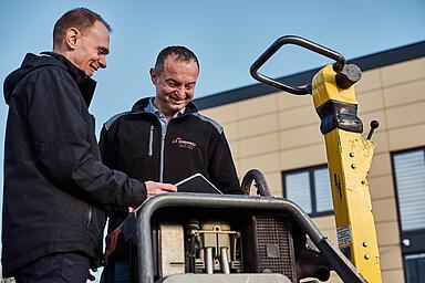 Two men in conversation
